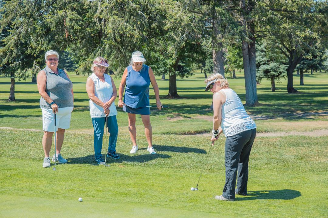 Group of women playing golf